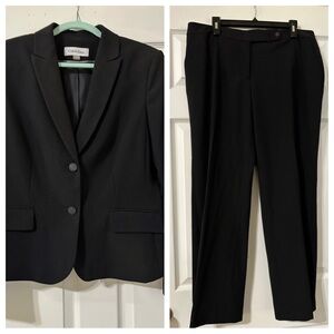 Calvin Klein, black suit in like new condition.